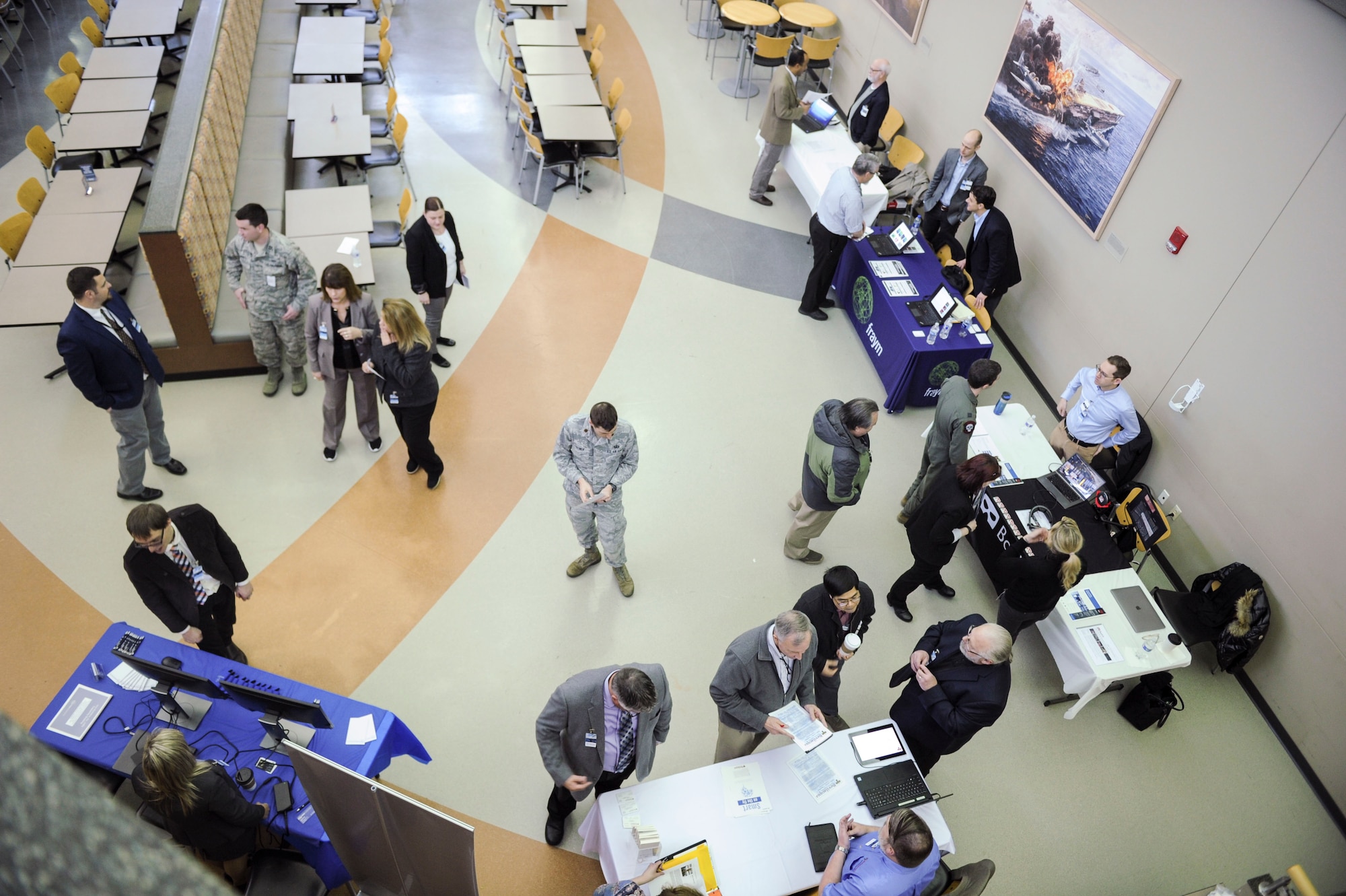 National Air and Space Intelligence Center members meet with representatives from a variety of technology companies during the Small Business Innovation Research Fair at Wright-Patterson AFB, Ohio, Feb. 6, 2020. The event showcased SBIR companies selected by NASIC subject matter experts as candidates to take on some of NASIC’s biggest technical challenges, artificial intelligence, machine learning, virtual reality, invisibility and big data. (U.S. Air Force photo by Staff Sgt. Seth Ray Stang.)