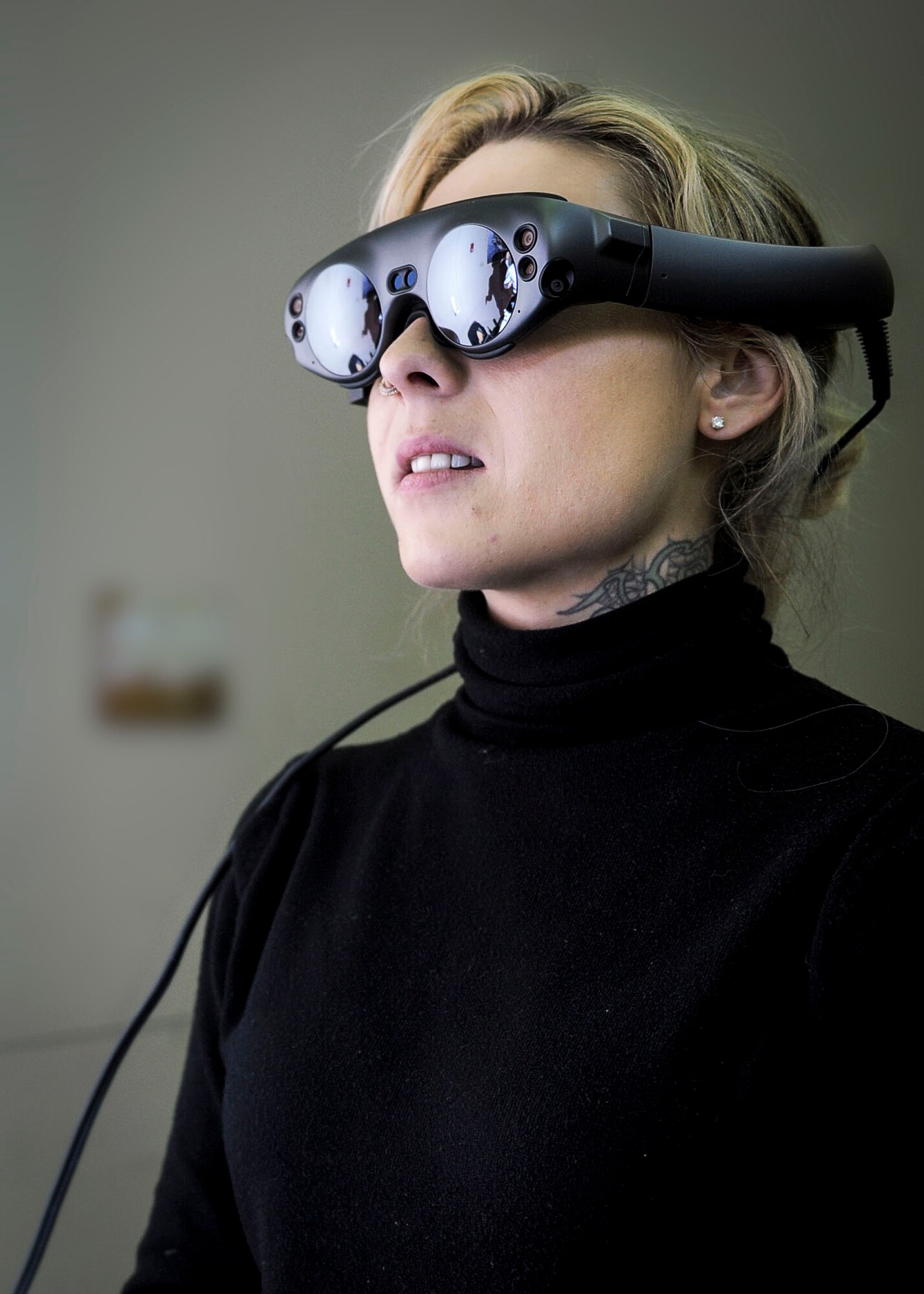 Suzanne Borders, BadVR CEO and cofounder, demonstrates the operations of her company’s virtual reality systems during the Small Business Innovation Research Fair at Wright-Patterson AFB, Ohio, Feb. 6, 2020. During the event, NASIC members filled out surveys for various technology companies. The results will influence which companies NASIC will support for future collaboration. (U.S. Air Force photo by Staff Sgt. Seth Ray Stang.)