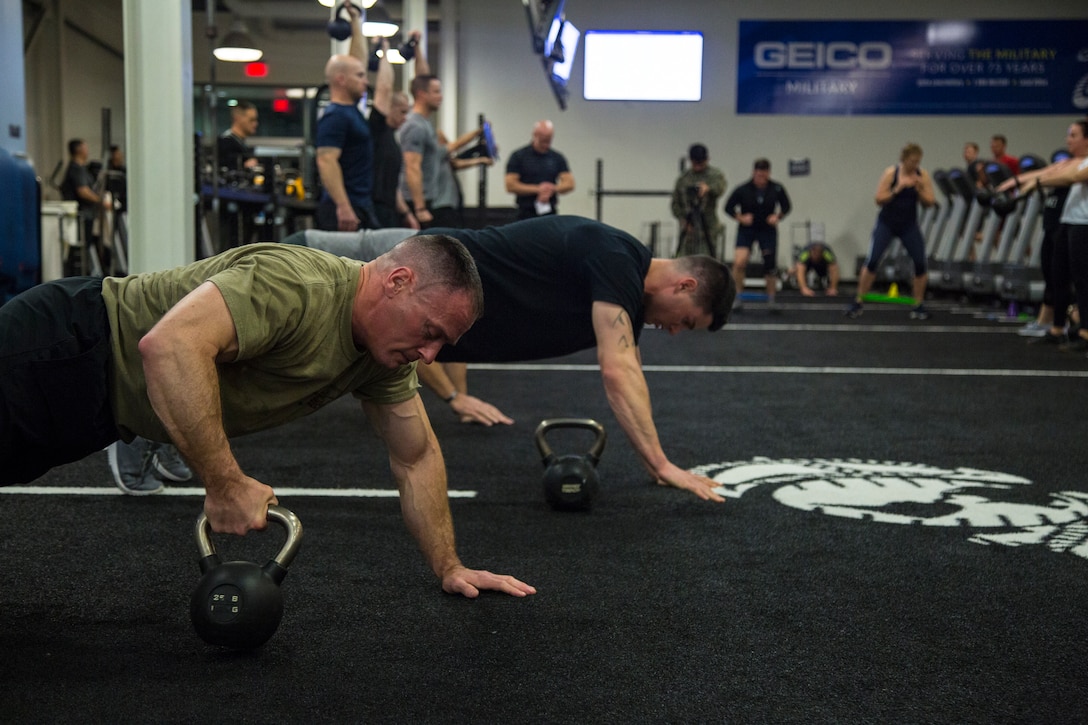 U.S. Marines and Sailors exercise during the Health, Wellness, and Fitness Summit at the Stone Bay Fitness Center on Stone Bay, Marine Corps Base Camp Lejeune, North Carolina, Feb. 5.