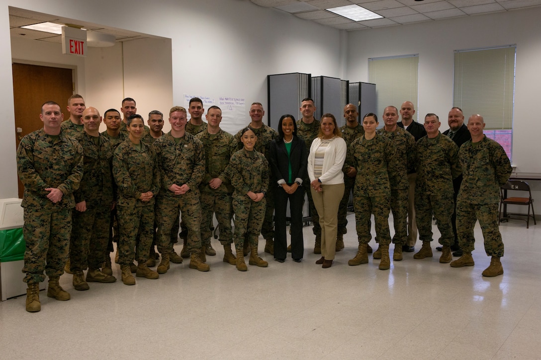 Marines participating in the week-long enlisted education and personal development summit pose for a group photo at the Marine Corps University at Quantico, V.A., Feb. 7.