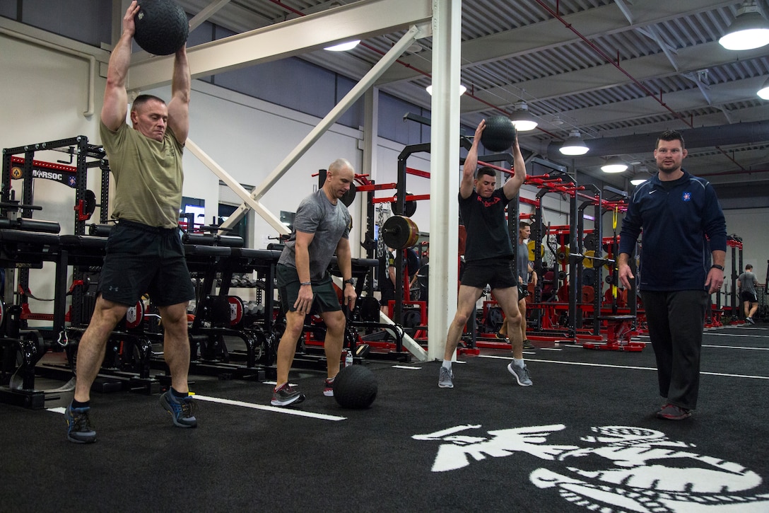 U.S. Marines and Sailors exercise during the Health, Wellness, and Fitness Summit at the Stone Bay Fitness Center on Stone Bay, Marine Corps Base Camp Lejeune, North Carolina, Feb. 5.