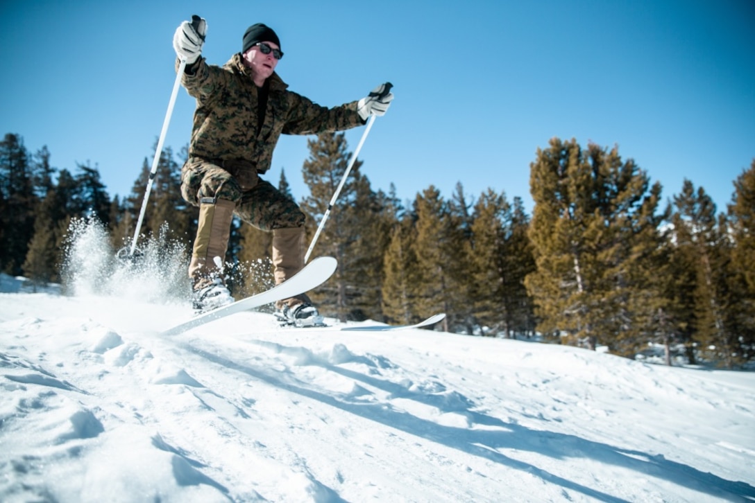 A U.S. Marine with 3rd platoon, Force Reconnaissance Company (FORECON), 2nd Marine Division, conducts a skiing-competency training event during Mountain Exercise 2-20 aboard Mountain Warfare Training Center in Bridgeport, California, Feb. 12, 2020. The training event provided FORECON the ability to further their competency in cold weather environments and increase their mobility, effectiveness, and warfighting excellence in the battlefield. (U.S. Marine Corps photo by Lance Cpl. Patrick King)