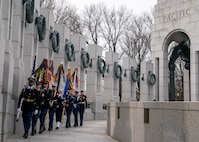 Army Gen. Mark A. Milley, chairman of the Joint Chiefs of Staff, and special guests participate in a ceremony and wreath presentation at the National World War II Memorial in Washington, D.C. to mark the 75th anniversary of the Battle of Iwo Jima. The 36 day-battle was part of a U.S. amphibious assault to capture the Japanese-held island of Iwo Jima, and resulted in a hard-fought American victory. Gen. Milley’s father, a Navy Corpsman with 4th Marine Division, was among the Marines who fought in the Battle of Iwo Jima.