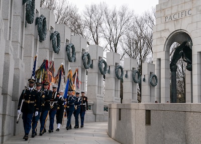 Army Gen. Mark A. Milley, chairman of the Joint Chiefs of Staff, and special guests participate in a ceremony and wreath presentation at the National World War II Memorial in Washington, D.C. to mark the 75th anniversary of the Battle of Iwo Jima. The 36 day-battle was part of a U.S. amphibious assault to capture the Japanese-held island of Iwo Jima, and resulted in a hard-fought American victory. Gen. Milley’s father, a Navy Corpsman with 4th Marine Division, was among the Marines who fought in the Battle of Iwo Jima.