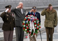Army Gen. Mark A. Milley, chairman of the Joint Chiefs of Staff, and special guests participate in a ceremony and wreath presentation at the National World War II Memorial in Washington, D.C. to mark the 75th anniversary of the Battle of Iwo Jima. The 36 day-battle was part of a U.S. amphibious assault to capture the Japanese-held island of Iwo Jima, and resulted in a hard-fought American victory. Gen. Milley’s father, a Navy Corpsman with 4th Marine Division, was among the Marines who fought in the Battle of Iwo Jima.