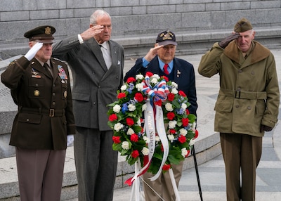 Army Gen. Mark A. Milley, chairman of the Joint Chiefs of Staff, and special guests participate in a ceremony and wreath presentation at the National World War II Memorial in Washington, D.C. to mark the 75th anniversary of the Battle of Iwo Jima. The 36 day-battle was part of a U.S. amphibious assault to capture the Japanese-held island of Iwo Jima, and resulted in a hard-fought American victory. Gen. Milley’s father, a Navy Corpsman with 4th Marine Division, was among the Marines who fought in the Battle of Iwo Jima.