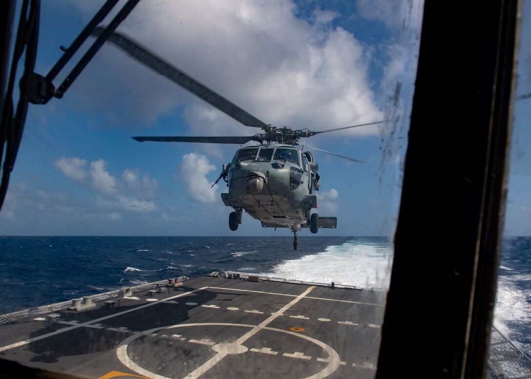 A helicopter takes off from USS Little Rock (LCS 9)