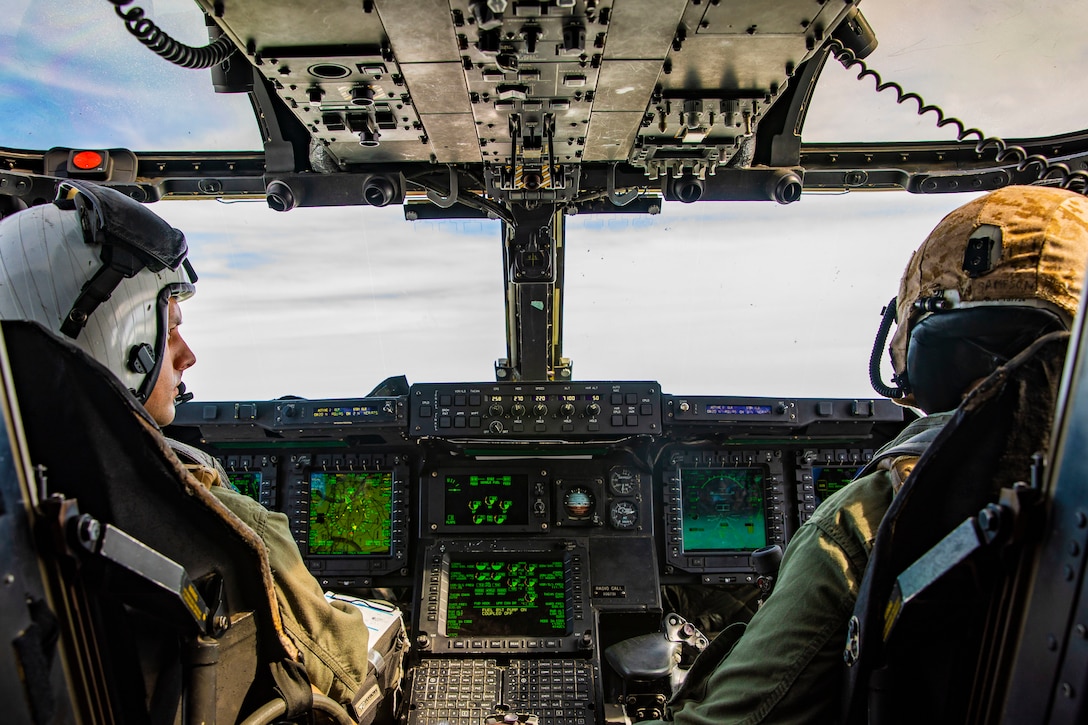 A MV-22B Osprey with Medium Tiltrotor Squadron VMM-263 prepares to receive fuel from a KC-130J Super Hercules from Marine Aerial Refueler Transportation Squadron 252 over the Atlantic Feb. 12.