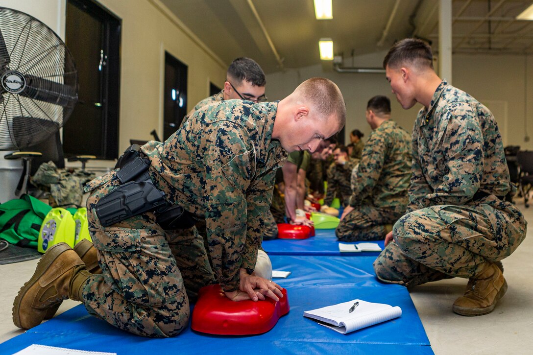 U.S. Marine Lance Cpl. John Jones, a sentry with the Provost Marshal’s Office, Security and Emergency Services Battalion, Marine Corps Base Camp Pendleton, practices cardiopulmonary resuscitation as part of a pre-service training course at the Military Police Training Facility on Camp Pendleton, California, Feb. 18.
