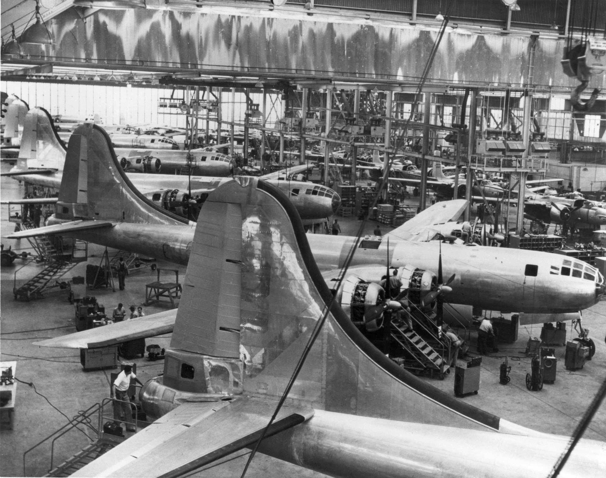 To create speed and increase production of 42 B-29s during 1950, the Ogden Air Materiel Area’s Maintenance Division devised a unique production line feature that consisted of turning the aircraft at a 45 degree angle to fit them through the hangar door.