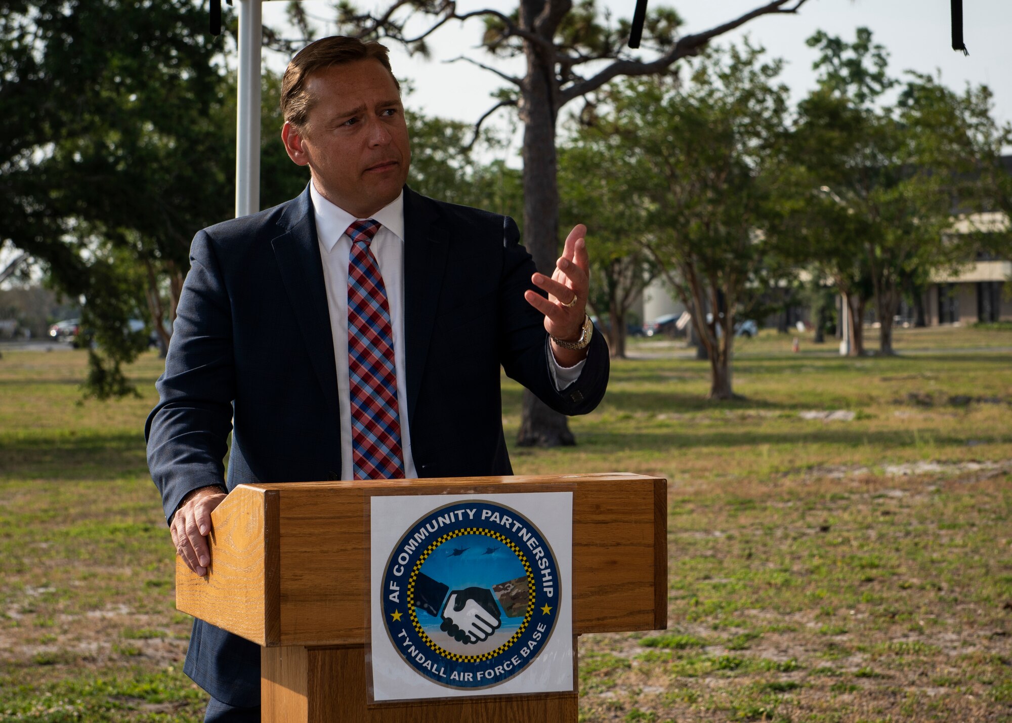 Chuck Purdue, Bay County tax collector, talks to base officials June 3, 2019, about the benefits of an agreement between Tyndall AFB, Florida, and the Bay County Tax Collector's Office  to bring a tax collector office to base. This is just one of many partnerships that benefits both the installation and the local community. (U.S. Air Force photo by Airman 1st Class Bailee A. Darbasie)