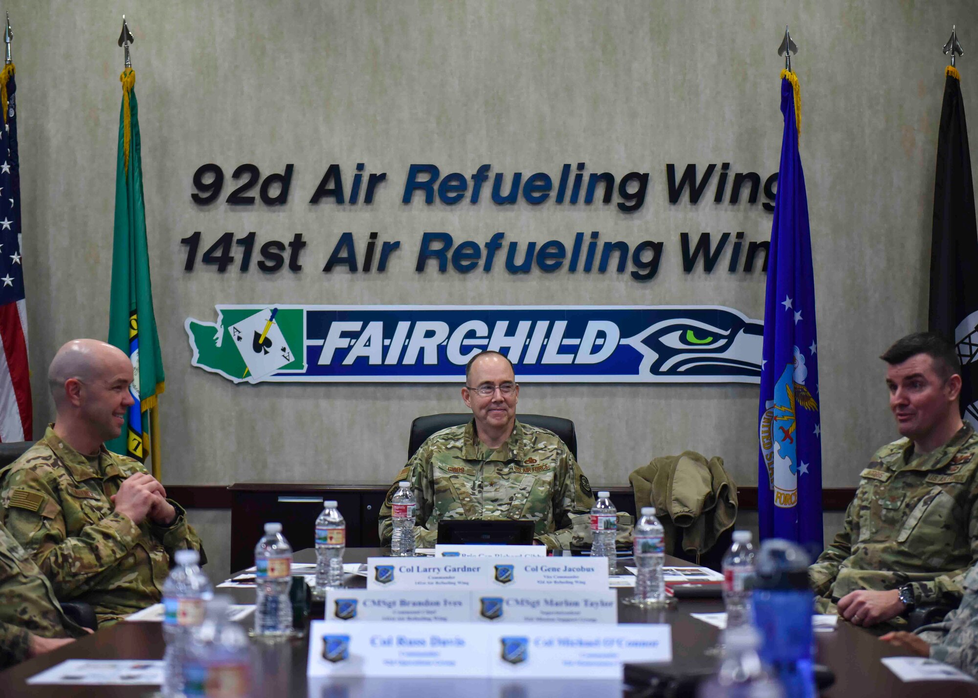 Brig. Gen. Richard Gibbs, Air Mobility Command director of logistics, engineering and force protection, receives a  mission brief during a tour at Fairchild Air Force Base, Washington, Feb. 10, 2020. Gibbs toured Fairchild AFB to learn more about innovations and modernization efforts being implemented to improve local processes and KC-135 aircraft availability. (U.S. Air Force photo by Airman 1st Class Kiaundra Miller)