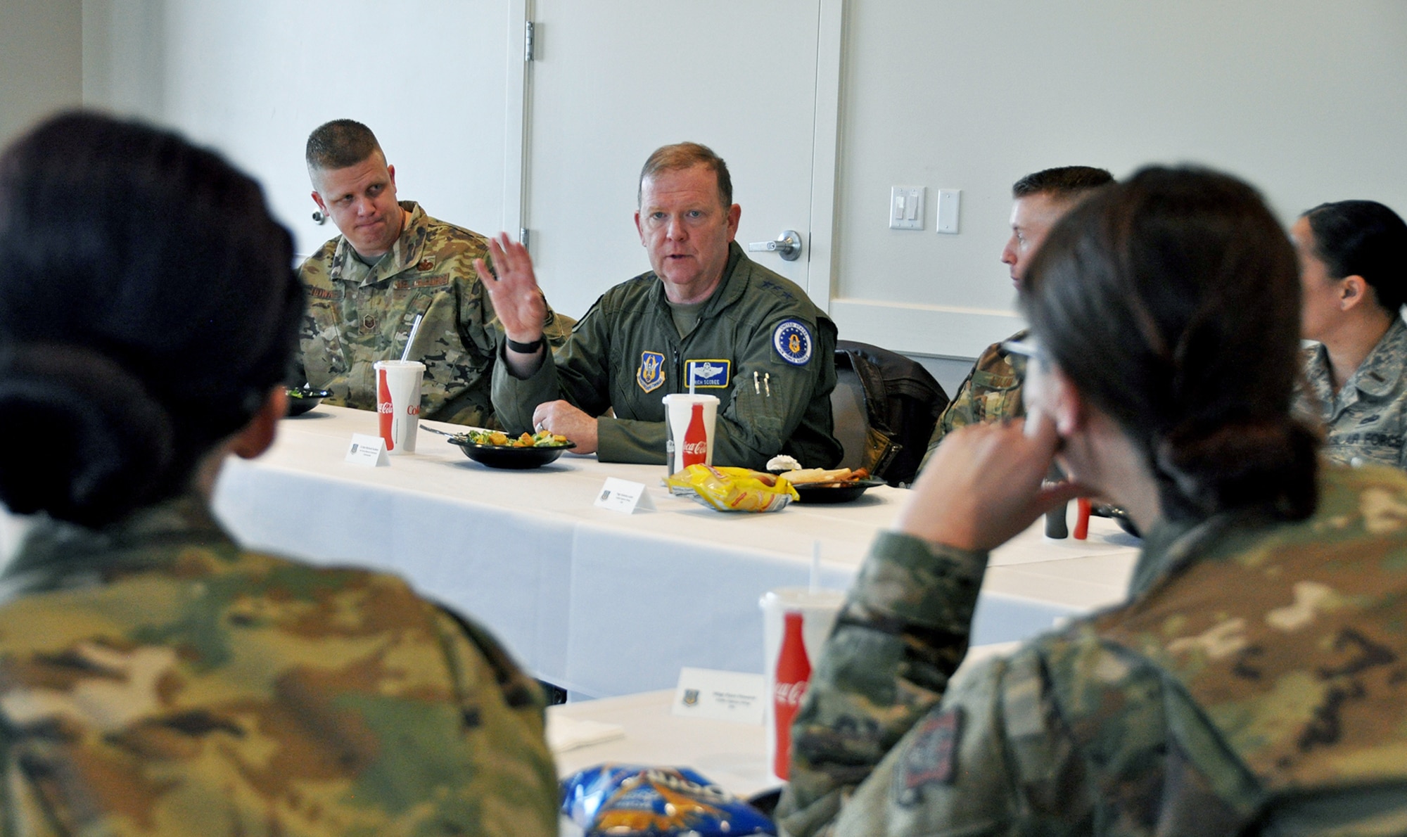 Lt. Gen. Richard Scobee, Air Force Reserve Command commander and chief of the Air Force Reserve, talks with reservists in the 419th Fighter Wing