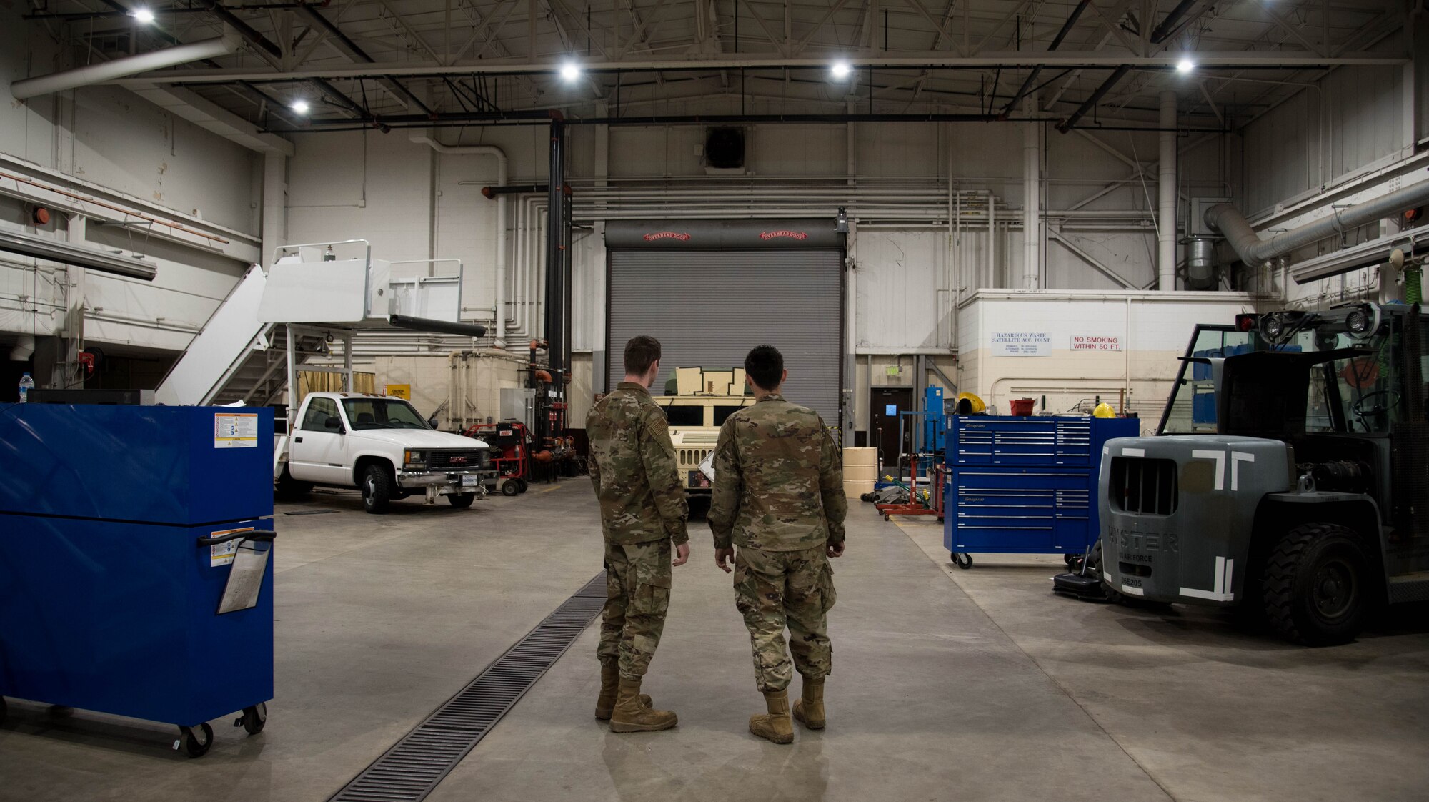 Vehicle Maintainers from the 375th Logistics Readiness Squadron evaluate vehicles.