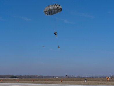 Indiana National Guard members joined forces with Ohio, Illinois and Idaho to conduct static-line, non‐tactical airborne operations from a C-130 Hercules at Columbus Airfield Feb. 18-19, 2020. The exercise provided the opportunity to conduct a currency jump and execute joint training with members of Scott Air Force Base, Idaho National Guard, and the Ohio Army Reserve.