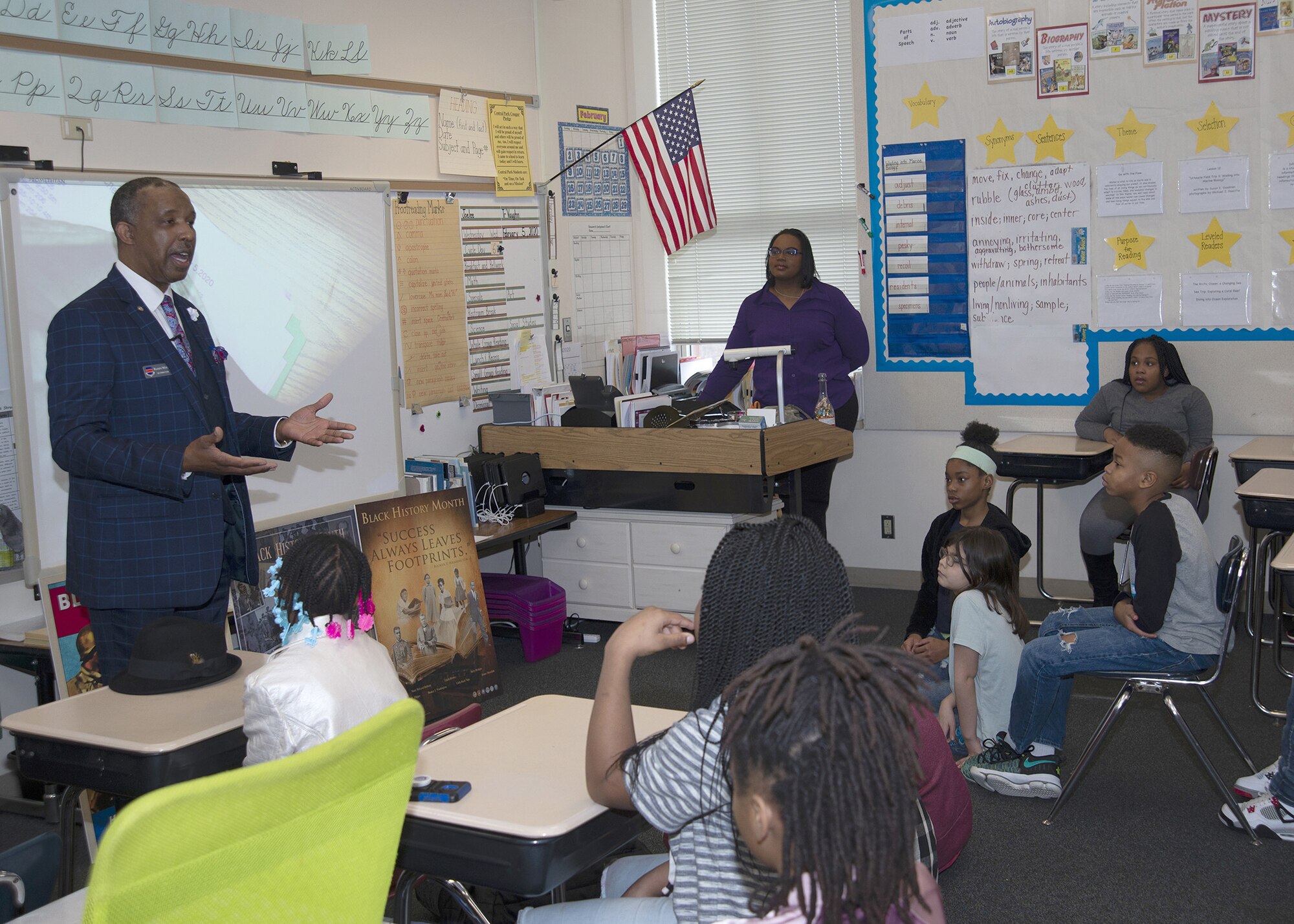 Man speaks to 5th graders about diversity and respect