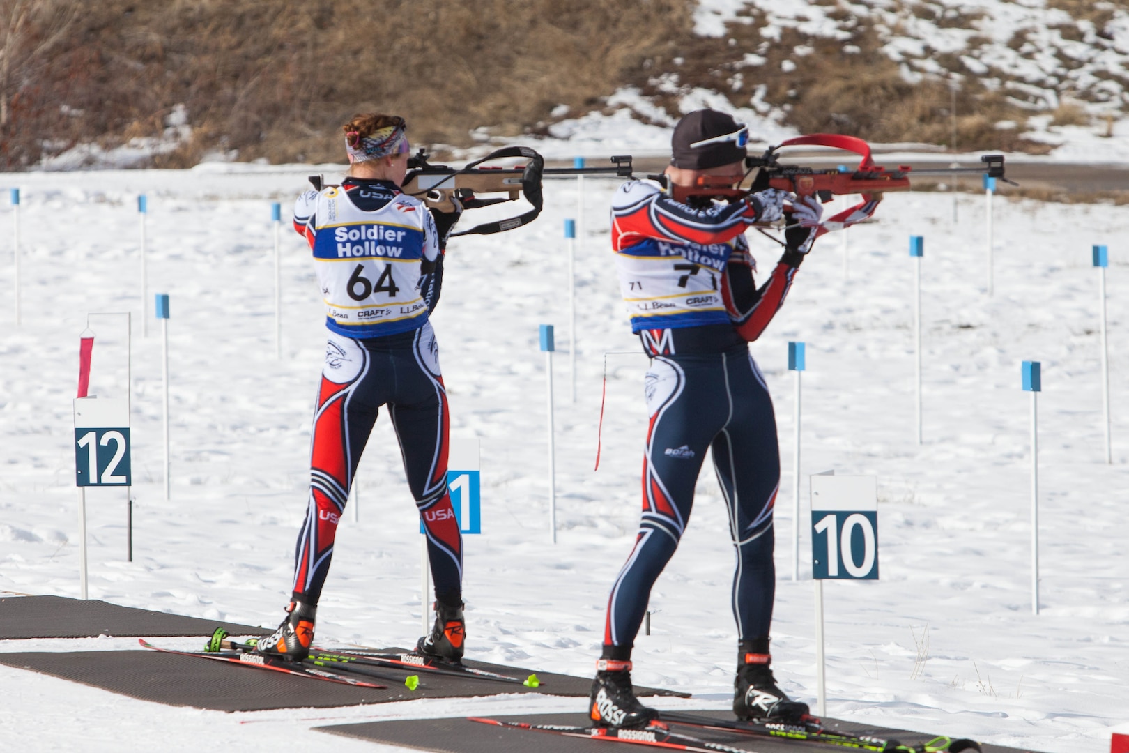 Siena and Jakob Ellingson, specialists in the Minnesota National Guard, shooting in a biathlon competition. The siblings enlisted in the Guard on the same day.
