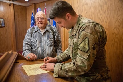 Veteran takes his Oath of Enlistment at the age of 79