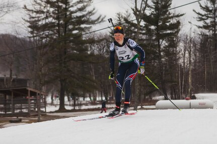 Spc. Siena Ellingson of the Minnesota National Guard skis in a biathlon competition. Ellingson and her brother, Jakob, enlisted in the Guard on the same day and have competed in the biathlon around the world.