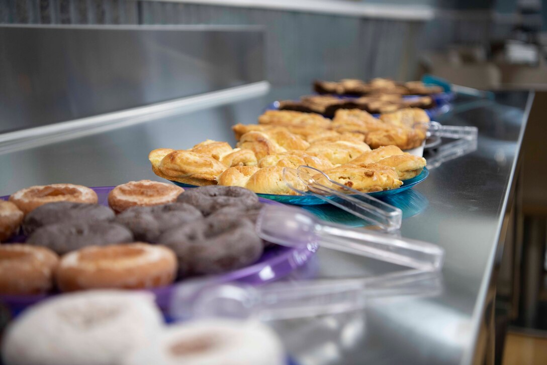 Desserts to be given out during the grand re-opening of Warren Lanes are displayed Feb. 18, 2020, on F.E. Warren Air Force Base, Wyo. The kitchen menu has many of the same items, but with some new heart-healthy options including salads and sandwiches added. (U.S. Air Force photo by Senior Airman Braydon Williams)