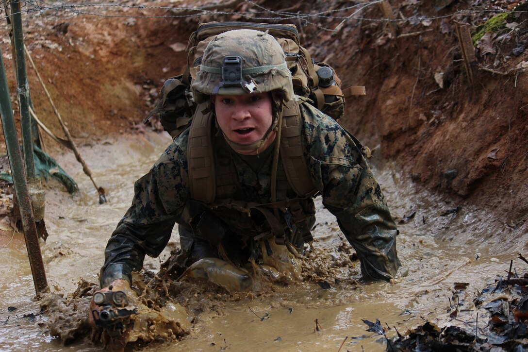 A Marine from Golf Company 7-19 runs the Endurance Course at The Basic School