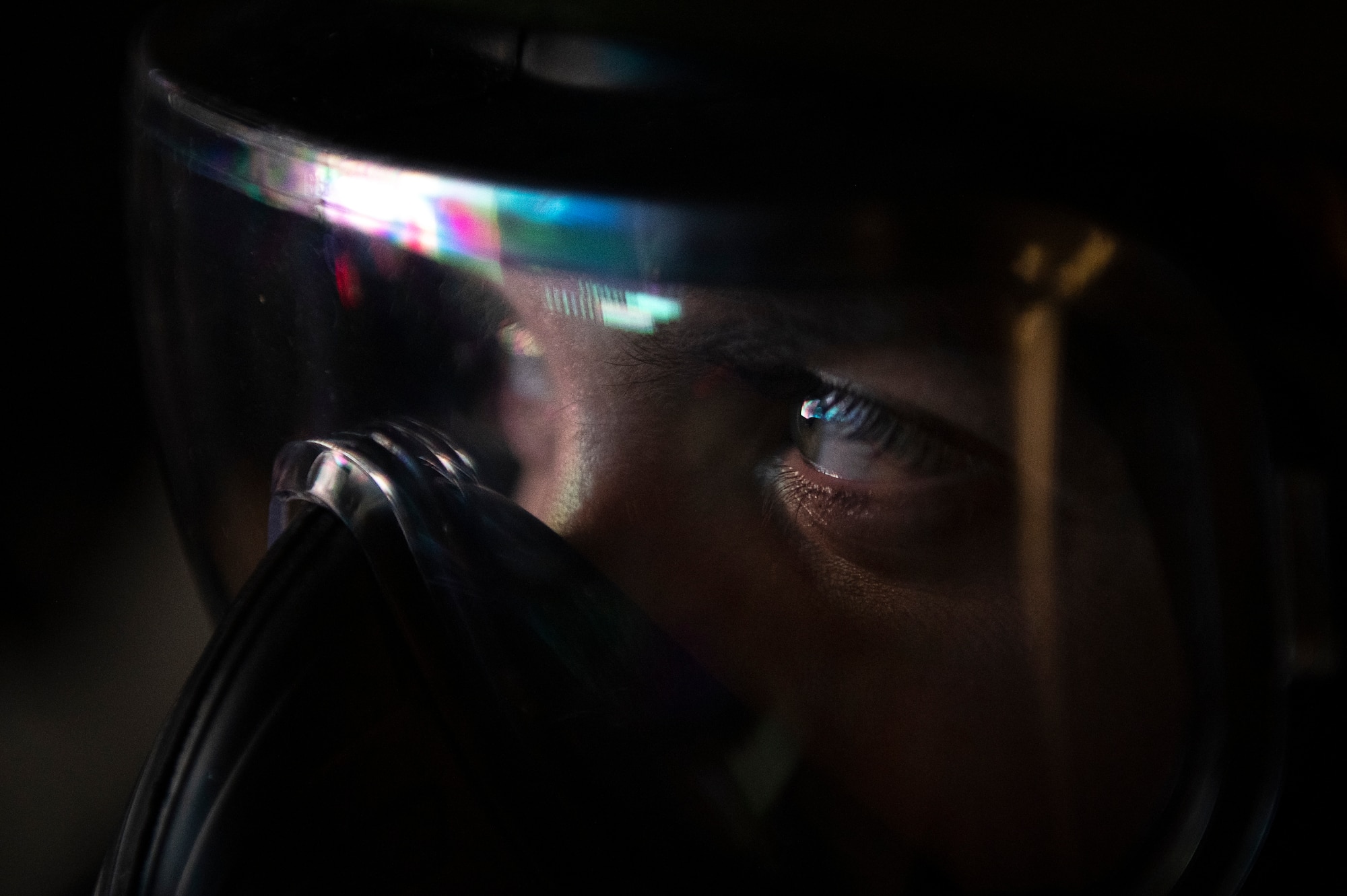 Airman takes precaution during a simulated attack