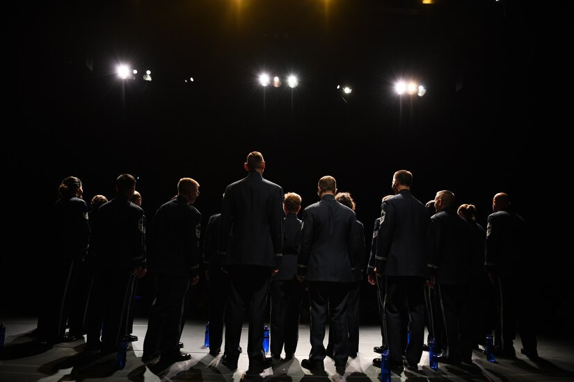 Members of the United States Air Force Band Singing Sergeants receive a standing ovation after a performance at the Antelope Valley College Performing Arts Theatre in Lancaster, Ca., Feb. 14, 2020. The singers performed a set of over 10 songs, one of which, entitled “Freedom Song”, was arranged by Senior Master Sgt. Benjamin Park, the Singing Sergeants superintendent and a bass vocalist. (U.S. Air Force photo by Airman 1st Class Spencer Slocum)