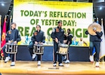 Students playing drums