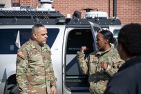 Air Force Master Sgt. Lakisha DeJesus, assigned to the Joint Task Force Civil Support (JTF-CS) J6 directorate briefs U.S. Army North Command Senior Enlisted Leader Command Sgt. Maj. Alberto Delgado on the command’s emergency response vehicle and it’s capabilities.
