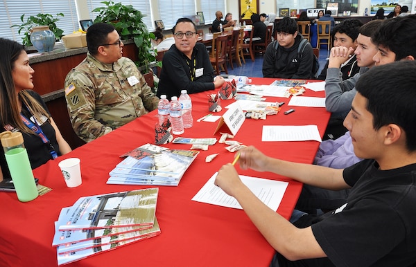 From right, U.S. Army Corps of Engineers Los Angeles District employees Jenna May, Capt. Gus Madrigal and Linh Do talk about their careers with ninth to 12th grade students Feb. 12 during John Muir High School’s Engineering and Environmental Science Academy Career Exploration Showcase in Pasadena, California.