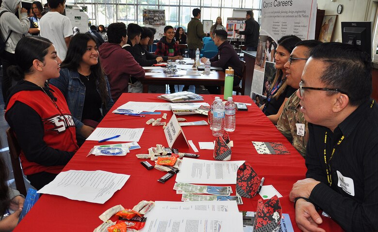 From right, U.S. Army Corps of Engineers Los Angeles District employees Jenna May, Capt. Gus Madrigal and Linh Do talk about their careers with ninth to 12th grade students Feb. 12 during John Muir High School’s Engineering and Environmental Science Academy Career Exploration Showcase in Pasadena, California.