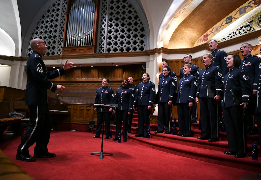 Master Sgt. Taylor Armstrong, U.S. Air Force Band Singing Sergeants conductor and vocalist, directs the band in Redlands, Ca., Feb. 14, 2020. Armstrong is the only enlisted conductor in the Air Force Band, all others being officers. (U.S. Air Force photo by Airman 1st Class Spencer Slocum)