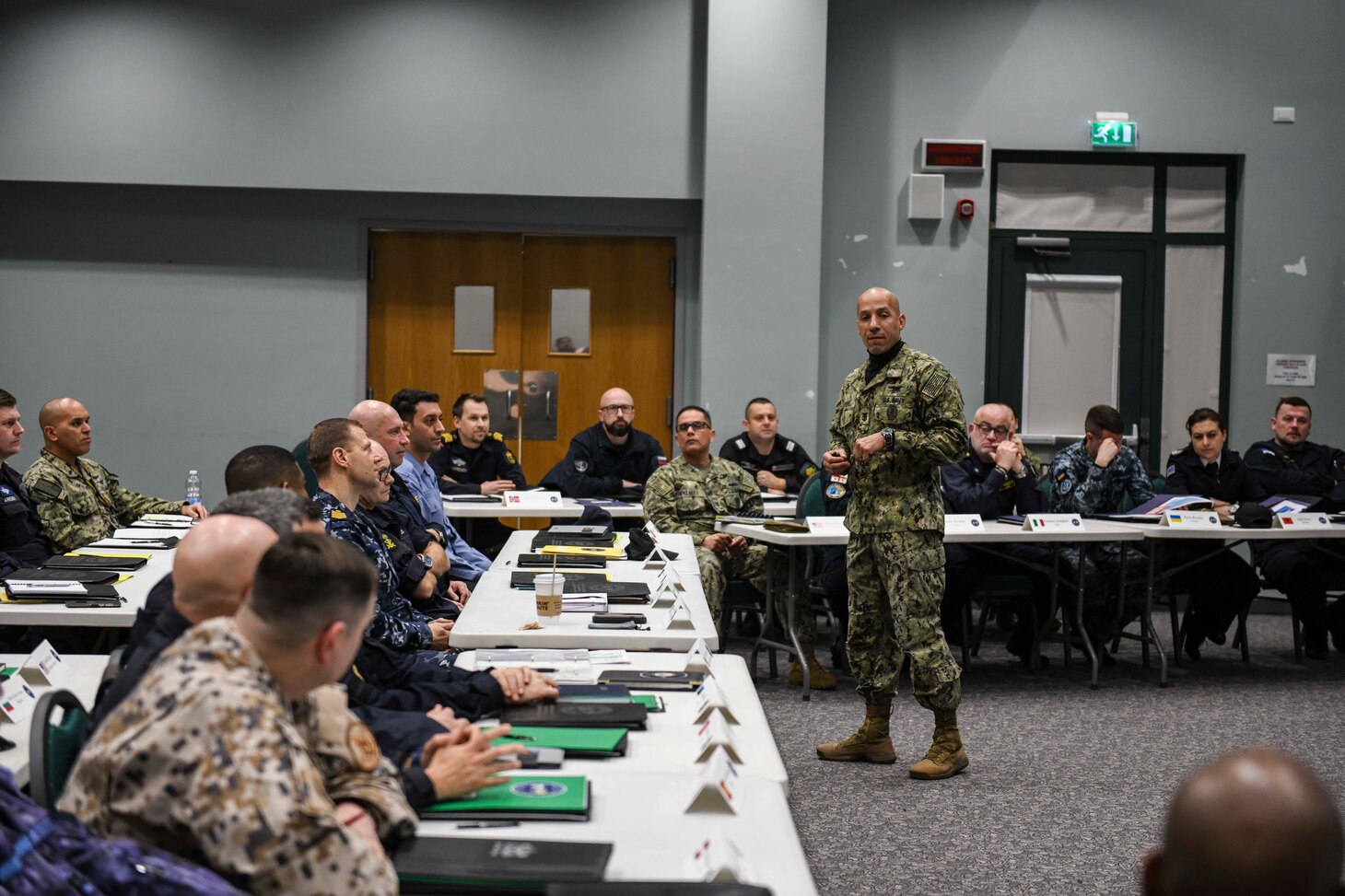 Naval Forces Europe-Africa Fleet Master Chief Derrick Walters speaks to senior enlisted leaders from 17 different nations during the Europe-Africa Senior Enlisted Leadership Symposium, held at Naval Support Activity Naples, Italy, Feb. 17, 2020.