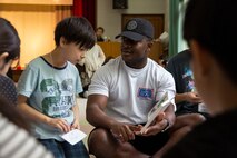 Volunteers from the Okinawa U.S. military community teach children during the English Day Camp at the Nago Youth House, Feb. 22, 2020, Nago, Okinawa, Japan