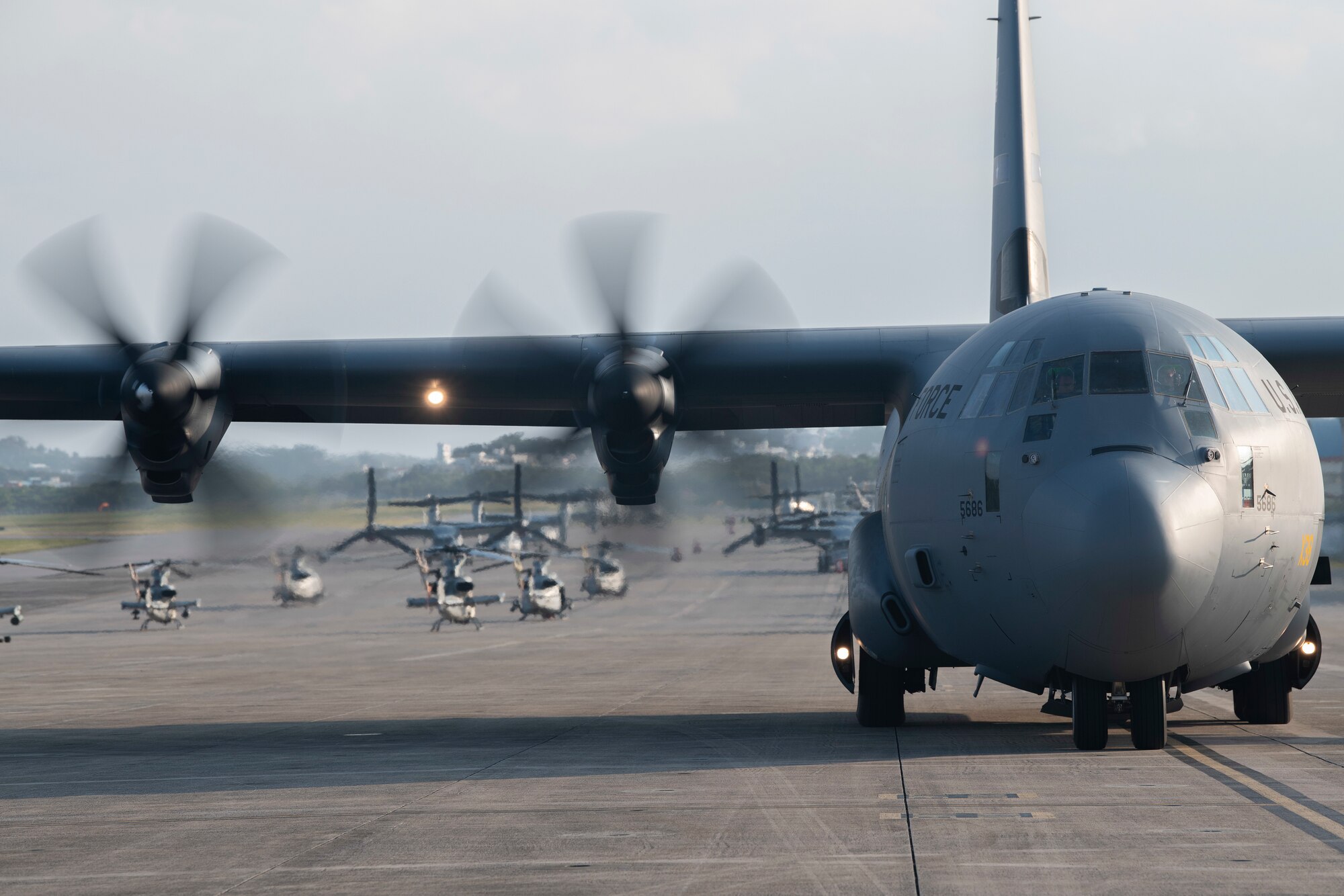 A U.S. Air Force C-130J Super Hercules, from Dyess Air Force Base, Texas, taxis to a parking spot during an Agile Combat Employment exercise Feb. 21, 2020, at Marine Corps Air Station Futenma, Japan. Exercises that utilize ACE concepts ensure forward-deployed forces in the Indo-Pacific are ready to protect and defend partners, allies and U.S. interests at a moment’s notice. (U.S. Air Force photo by Senior Airman Rhett Isbell)