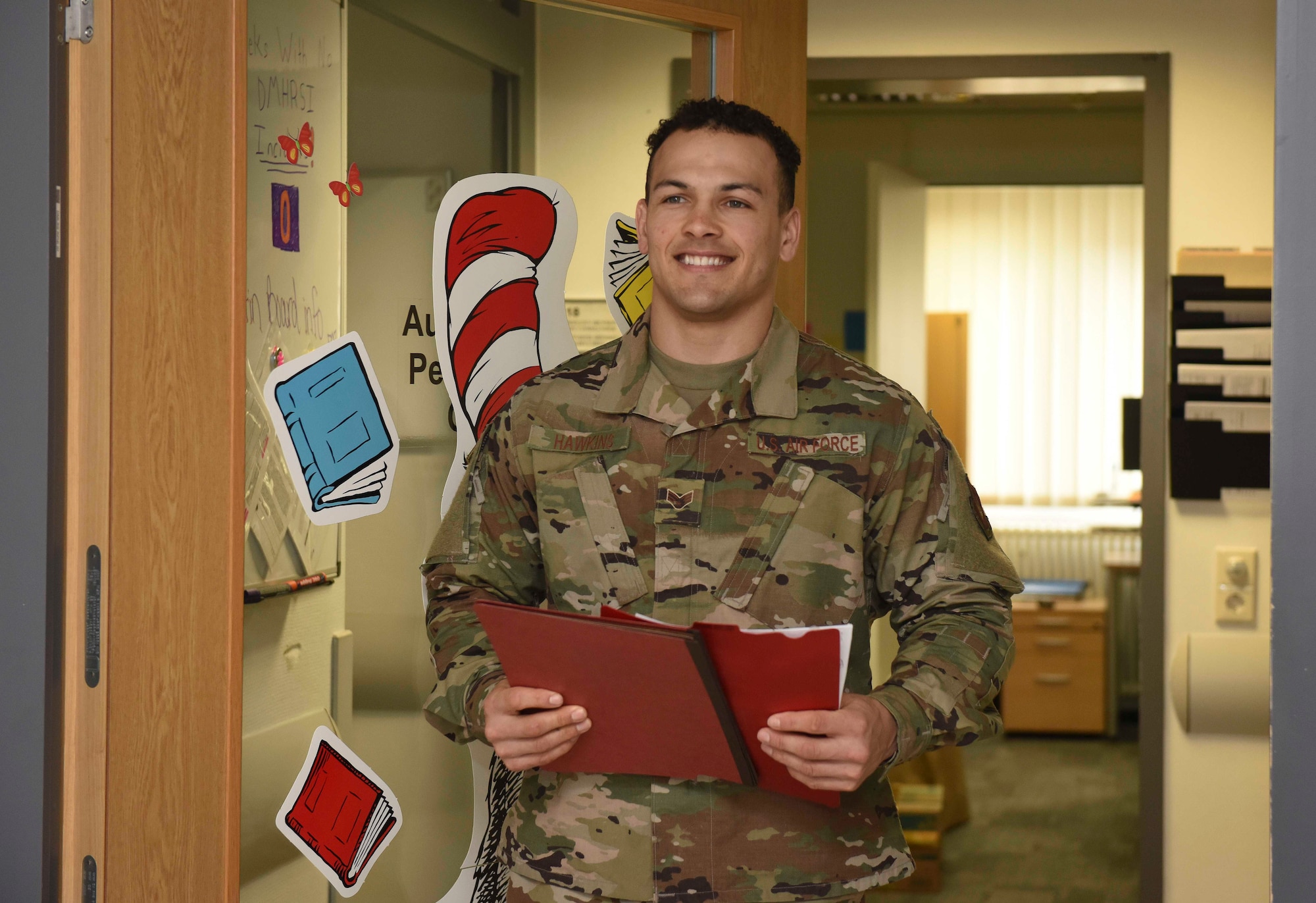 U.S. Air Force Senior Airman David Hawkins, 86th Medical Operations Squadron pediatric medical technician, works at the Pediatric Developmental Clinic at Ramstein Air Base, Germany, Feb. 21, 2020. Hawkins volunteers around Ramstein, teaching Airmen how to achieve better fitness and nutrition.