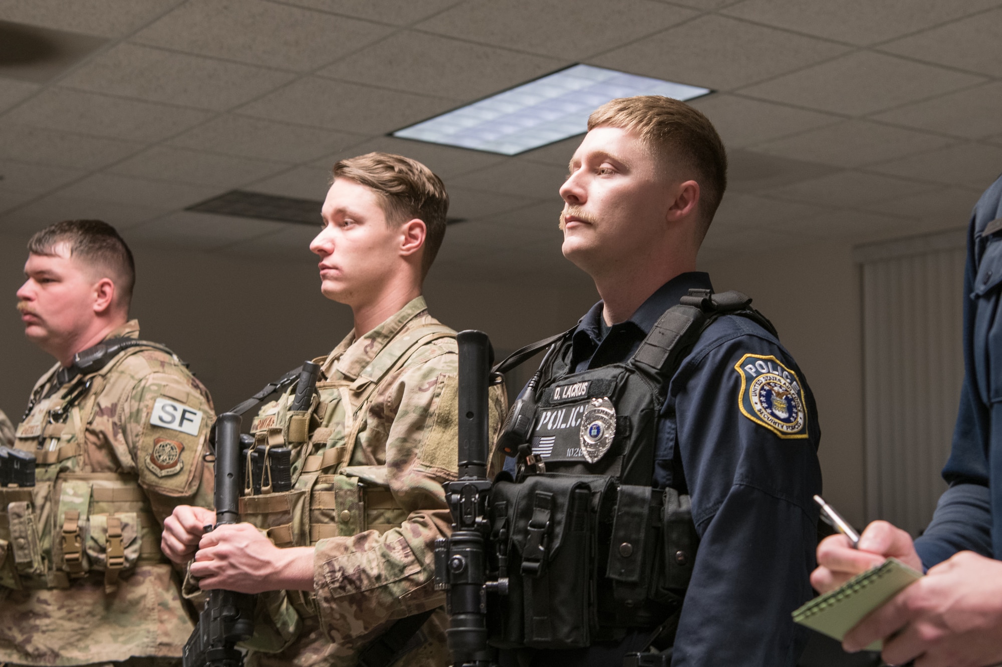 fficer Dillon Lackus, 436th Security Forces Squadron Department of the Air Force Police officer attends guard mount, Feb. 13, 2020, at Dover Air Force Base, Delaware. Guard mount is an official pre-shift formation attended by security forces Airmen and DAF police officers to receive assignments, special instructions and other information pertinent to their shift from their flight chief. (U.S. Air Force photo by Mauricio Campino)