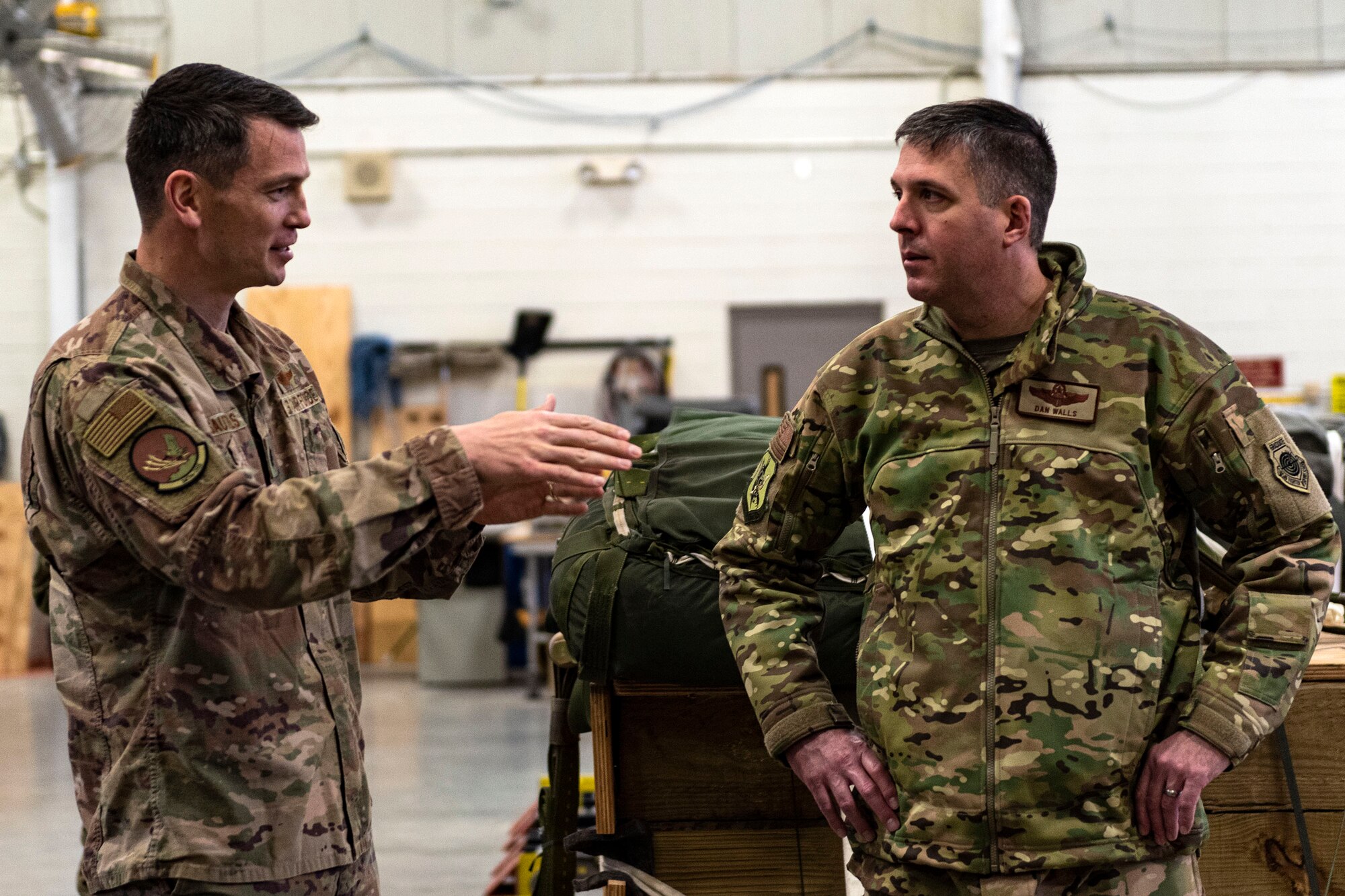 Photo of a director of operations briefing a commander.