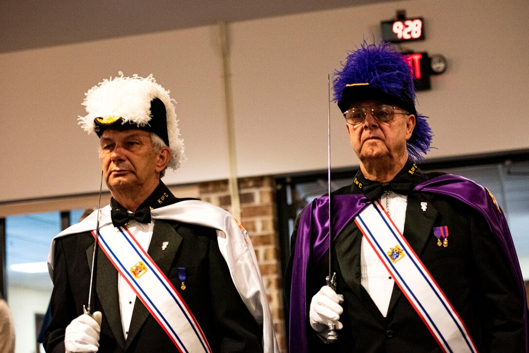 Photo of Knights of Columbus entering into a sanctuary.