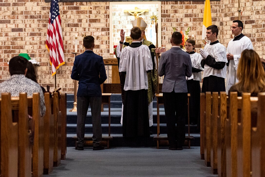 Photo of a congregation renewing their baptismal promises.