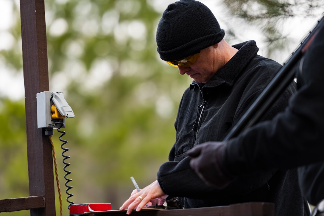 A photo of an Airman recording scores
