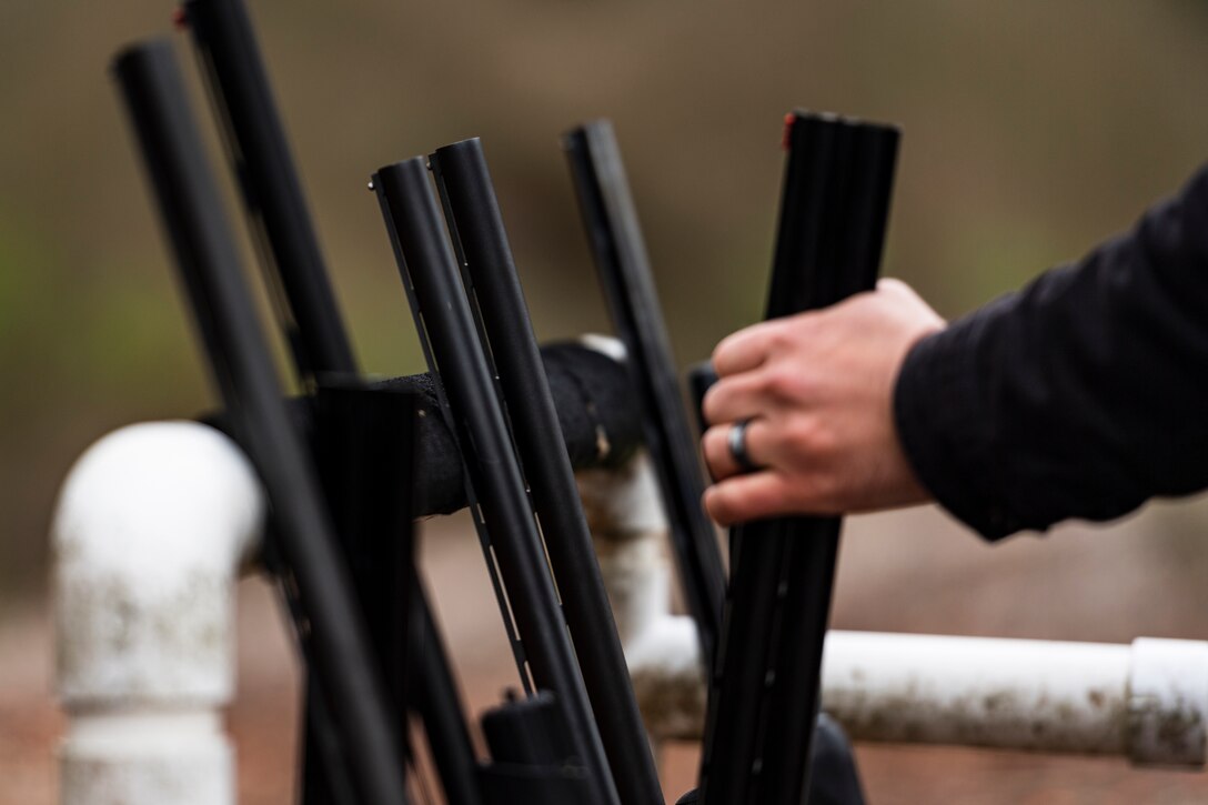 A photo of a participant taking a shotgun