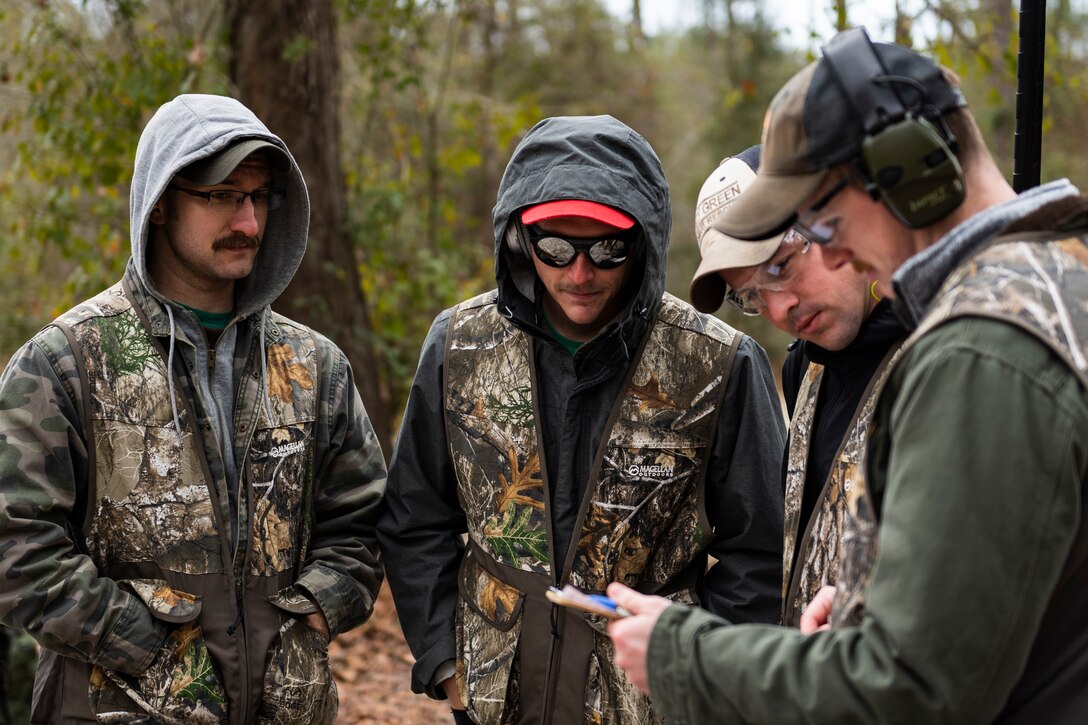 A photo of participants reading a score sheet