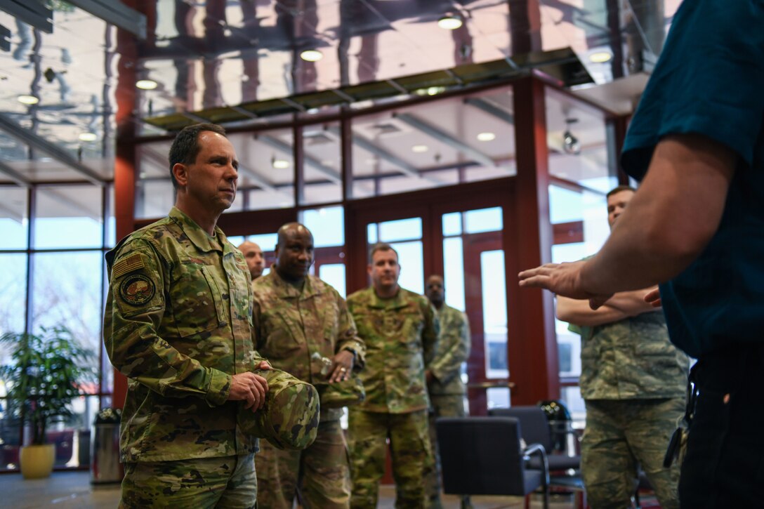 Maj. Gen. John Shaw, Combined Force Space Component commander, U.S. Space Command, and commander, Space Operations Command, U.S. Space Force, receives a briefing about current and future projects within the restricted area at Buckley Air Force Base, Colo., Feb. 21, 2020.