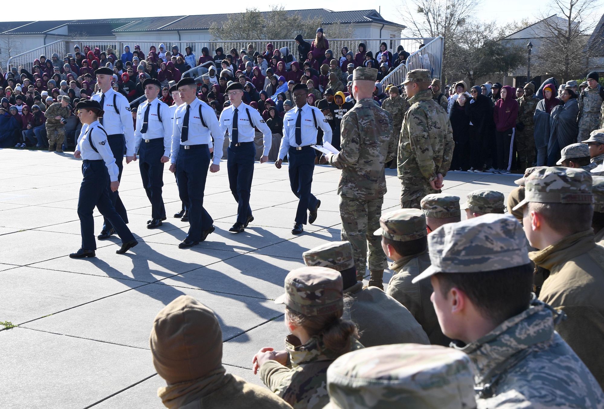 Members of the 338th Training Squadron regulation drill team perform during the 81st Training Group drill down on the Levitow Training Support Facility drill pad at Keesler Air Force Base, Mississippi, Feb. 21, 2020. Airmen from the 81st TRG competed in a quarterly open ranks inspection, regulation drill routine and freestyle drill routine. Keesler trains more than 30,000 students each year. While in training, Airmen are given the opportunity to volunteer to learn and execute drill down routines. (U.S. Air Force photo by Kemberly Groue)