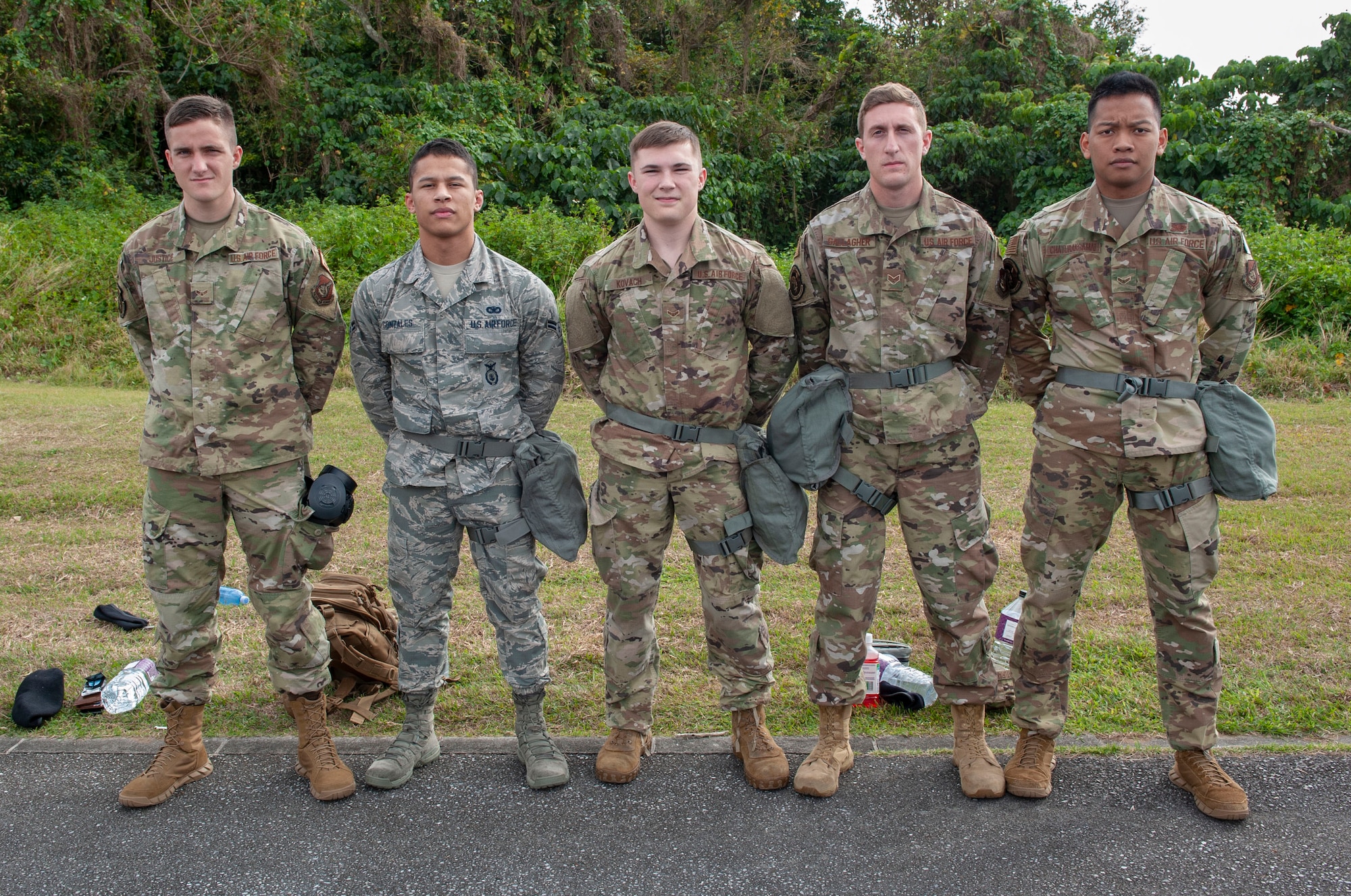 Airmen from the 18th Security Forces Squadron attend the Defenders Challenge Feb. 13, 2020, at Kadena Air Base, Japan. The members participated in the Defenders Challenge, an event that challenges participants to run through an obstacle course designed to test their physical and mental abilities. (U.S. Air Force photo by Naoto Anazawa)