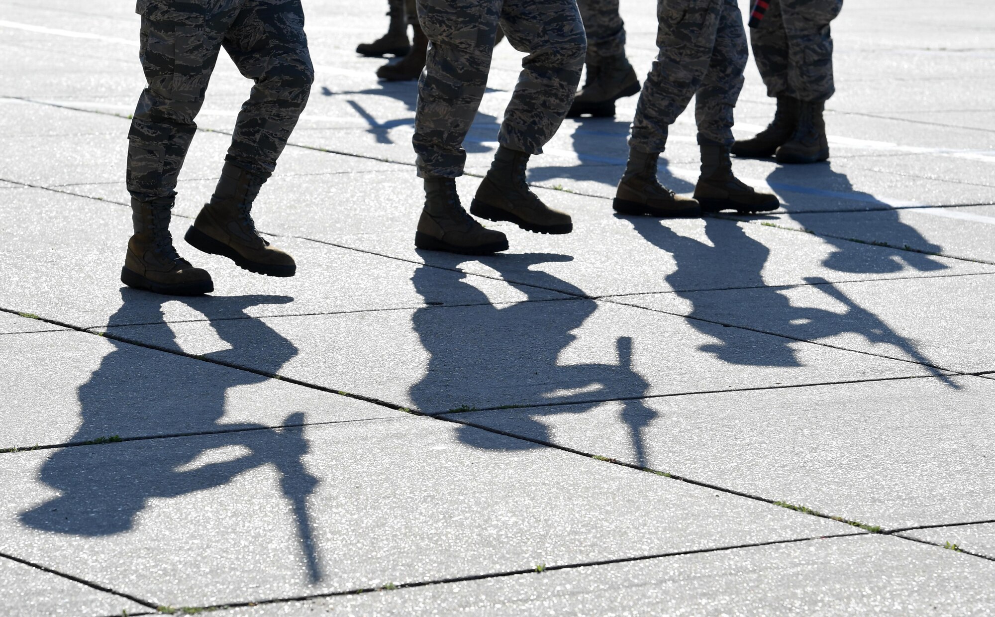 Members of the 335th Training Squadron freestyle drill team perform during the 81st Training Group drill down on the Levitow Training Support Facility drill pad at Keesler Air Force Base, Mississippi, Feb. 21, 2020. Airmen from the 81st TRG competed in a quarterly open ranks inspection, regulation drill routine and freestyle drill routine. Keesler trains more than 30,000 students each year. While in training, Airmen are given the opportunity to volunteer to learn and execute drill down routines. (U.S. Air Force photo by Kemberly Groue)