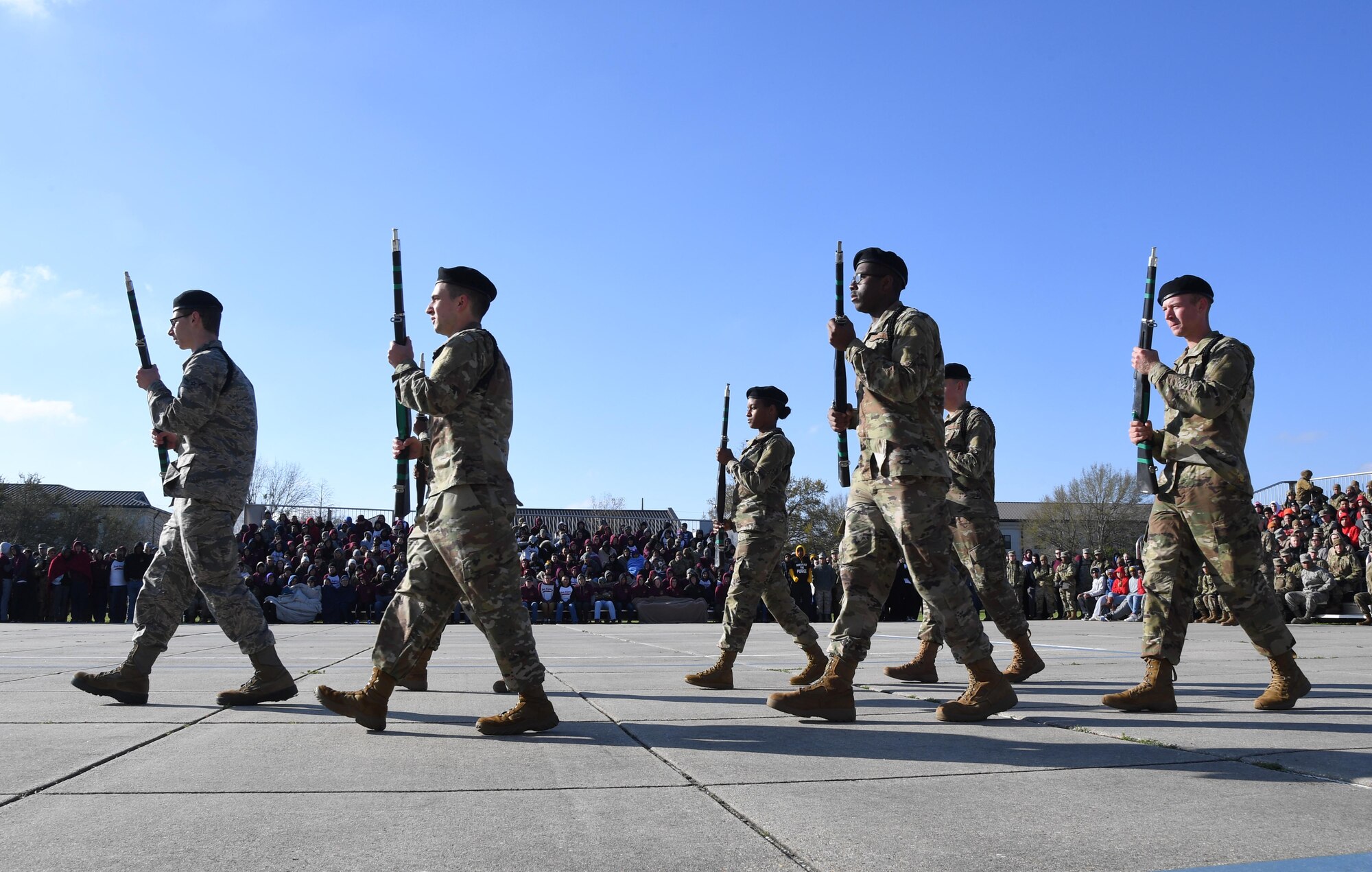 Members of the 334th Training Squadron freestyle drill team perform during the 81st Training Group drill down on the Levitow Training Support Facility drill pad at Keesler Air Force Base, Mississippi, Feb. 21, 2020. Airmen from the 81st TRG competed in a quarterly open ranks inspection, regulation drill routine and freestyle drill routine. Keesler trains more than 30,000 students each year. While in training, Airmen are given the opportunity to volunteer to learn and execute drill down routines. (U.S. Air Force photo by Kemberly Groue)