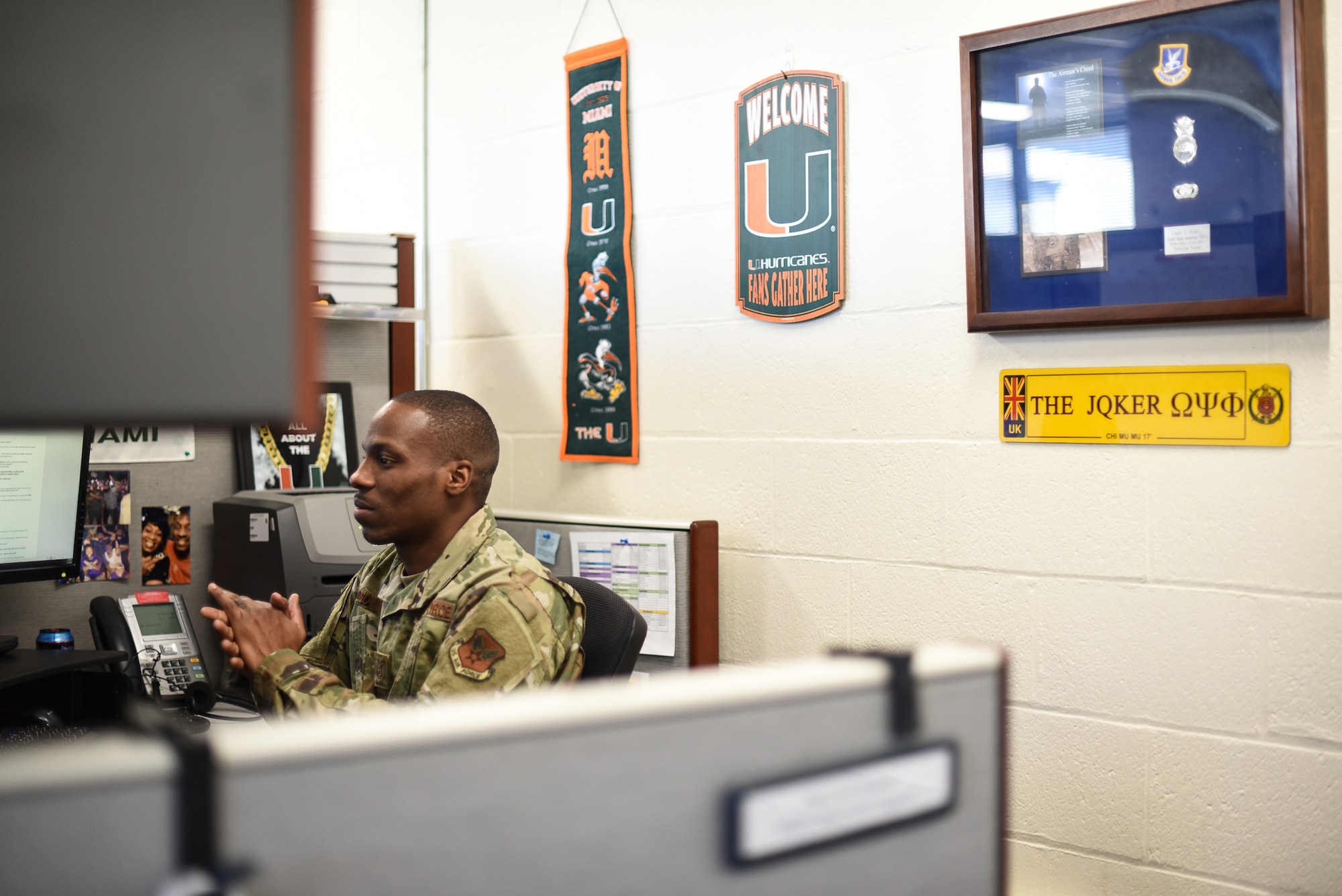 Tech. Sgt. Corey Nowell, noncommissioned officer in charge of movement support at the Joint Personal Property Shipping Office Northeast, sits at his desk at Hanscom Air Force Base, Mass., Feb. 21. Nowell shares his personal story of resilience in battling depression and overcoming his professional and personal obstacles in hopes to inspire his wingmen to seek help. (U.S. Air Force photo by Mark Herlihy)