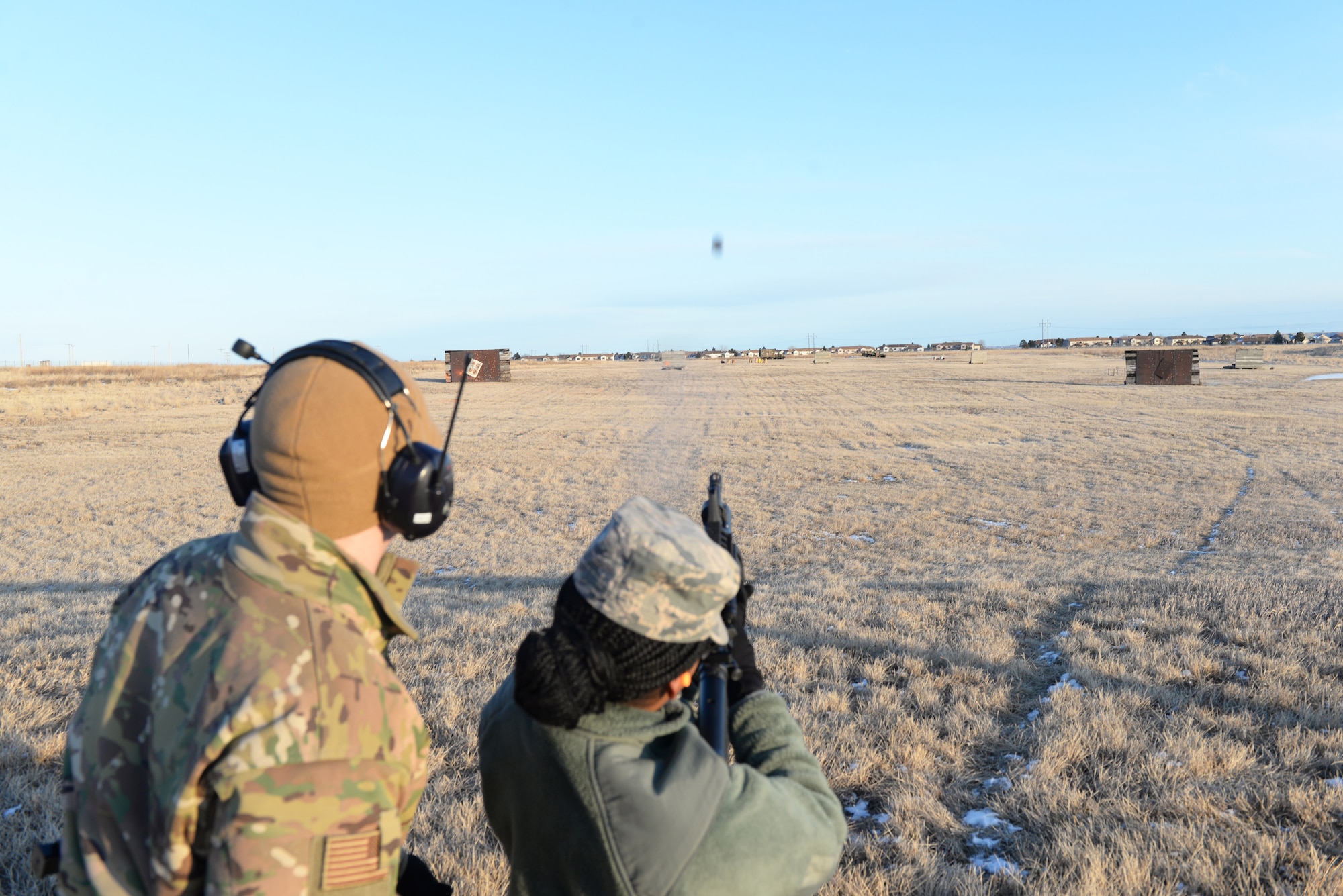 Airman Fires Grenade Launcher